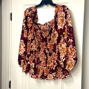 Bought the shirt at Maurices it fits a little bigger than an extra large.